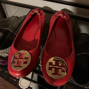 Tory Burch Red Ballet flats with gold tone medallion. Size 10